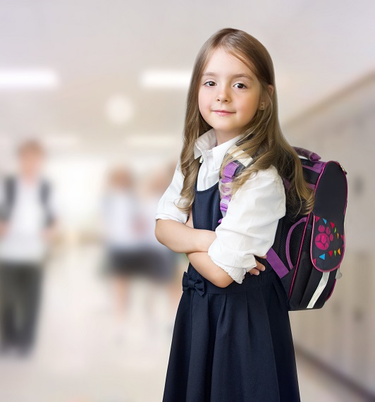 decorative young school girl with bookbag