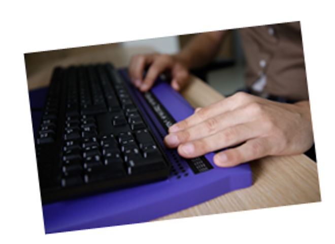image of hands on a keyboard device